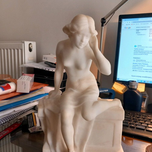 Marble sculpture of seated young woman Art Deco 1900-1930 used