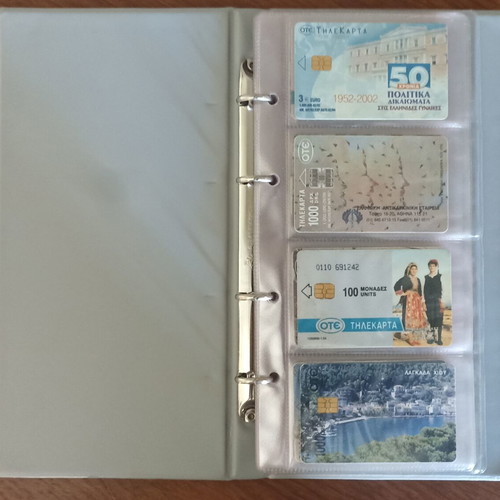Phone card collection used, 42 pieces with album