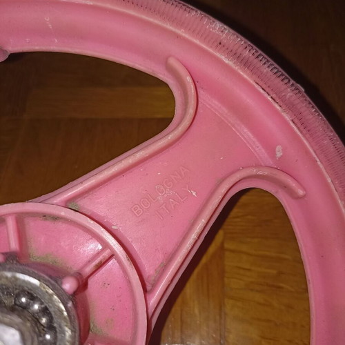 Front 12-inch plastic pink bicycle rim used Italian brand