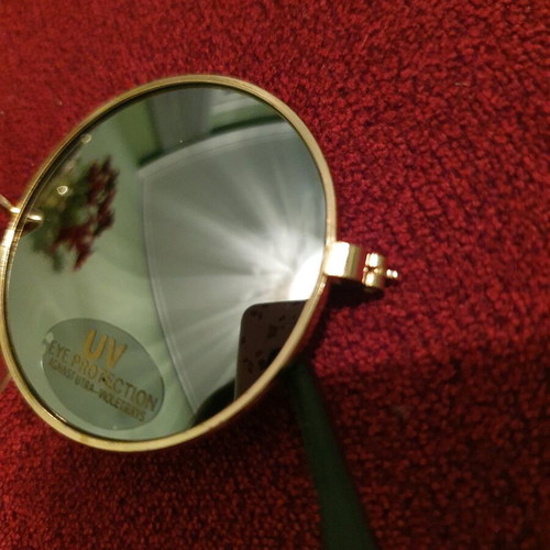 Sunglasses new, gold color