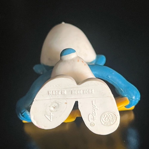 Collectible Smurf figure with musical scroll like new