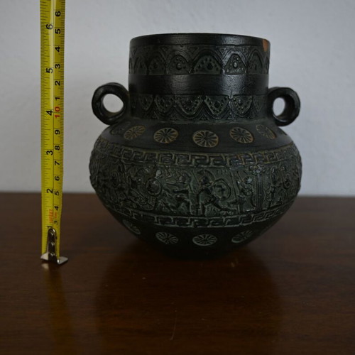 Decorative ceramic vase in ancient style with geometric motifs