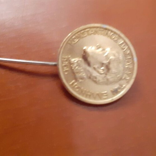 Collectible pin 1966 like new, gold-colored