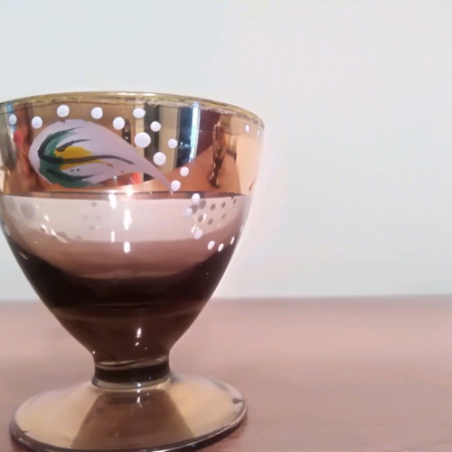 Liqueur glasses used, 4 handmade painted and 5 carved crystal