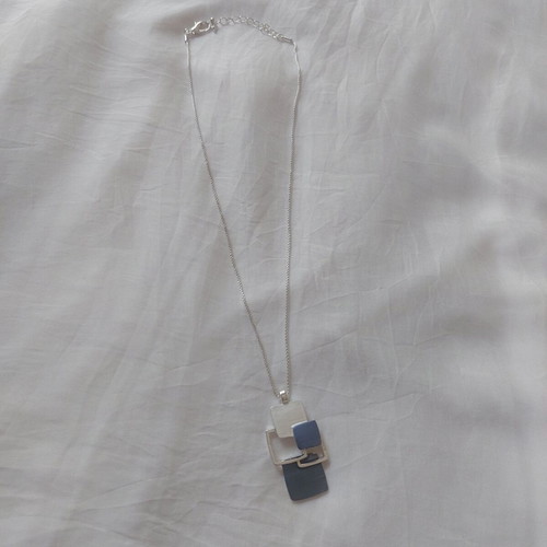 Geometric Blue necklace like new, modern design in silver and blue