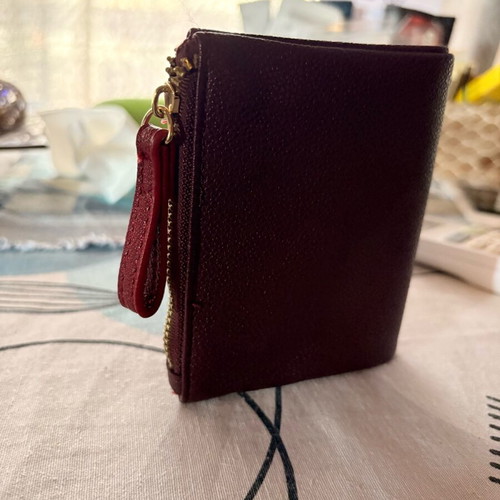Carpisa wallet like new, burgundy with 6 card slots and coin zipper