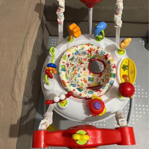 Jumpero baby jumper with detachable toys like new
