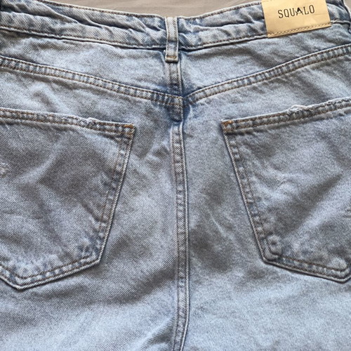Jeans with asymmetrical buttoning like new, size M, blue