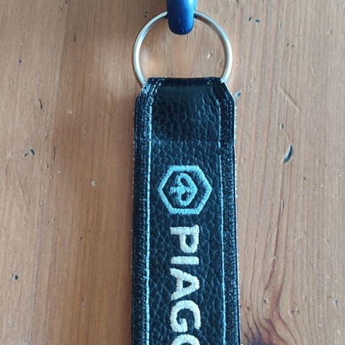 Piaggio leather fabric keychain
