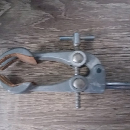 Old laboratory tools used for holding test tubes and bottles
