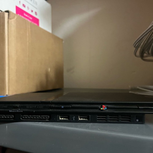 Sony PlayStation 2 used, scratched controllers, excellent box