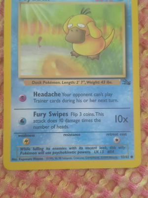 Psyduck Pokemon card used