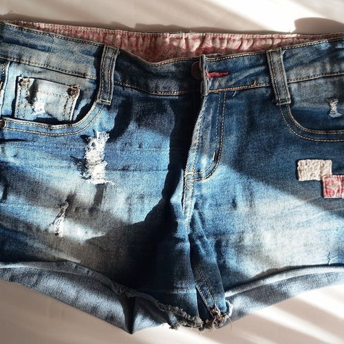 Denim shorts like new with worn details and patches, size S