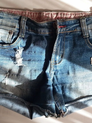 Denim shorts like new with worn details and patches, size S