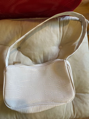 White shoulder bag used with small marks