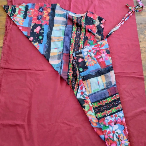 Slanted women's tunic blouse used, size medium, with belt