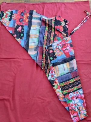 Slanted women's tunic blouse used, size medium, with belt