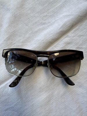 Gucci sunglasses used, black and brown