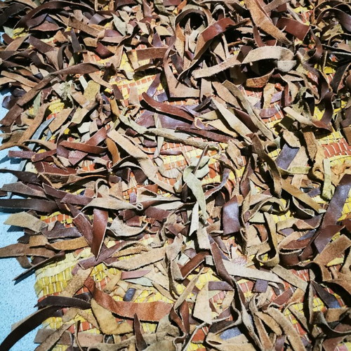 Leather flokati rug like new, brown shades, 138cm x 64cm