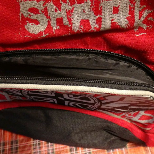 School bag used, red with multiple compartments