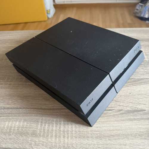 PlayStation 4 (PS4) 500GB console like new with controller and power cable