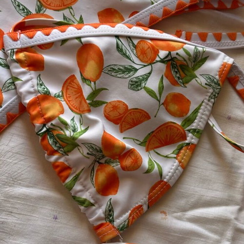 Women's swimsuit like new, white and orange with orange print, size M