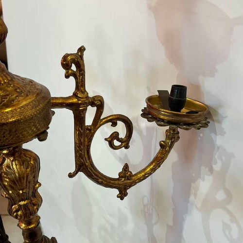 Vintage brass floor lamp with ornate baroque designs used