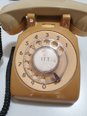 Old telephone used, functional