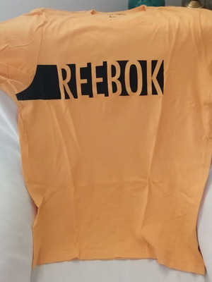 Reebok T-shirt Large like new, orange color