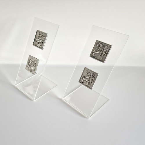 Set of 2 stands with 2 silver Parthenon sculpture depictions