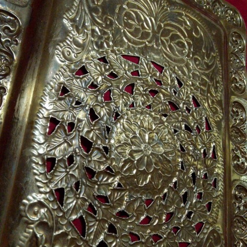 Vintage brass serving tray with embossed handles and angel motifs like new