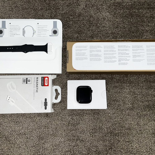 Apple Watch Series 11 46mm Demo Edition with compatible charger