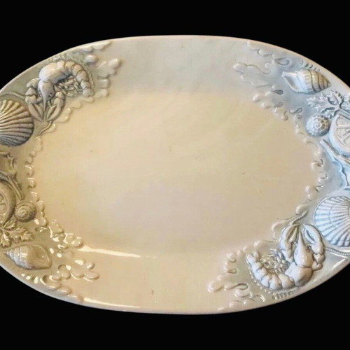 Oval ceramic platters used with summer-themed carving