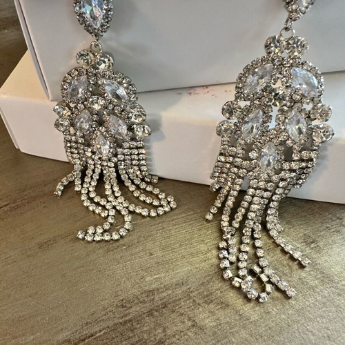 Earrings new with crystals, silver color