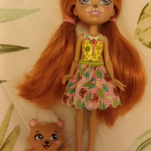 Doll with her pet like new