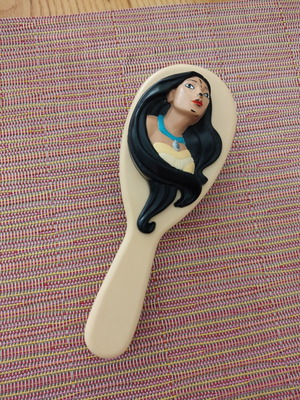 Vintage hairbrush with Disney Pocahontas relief used