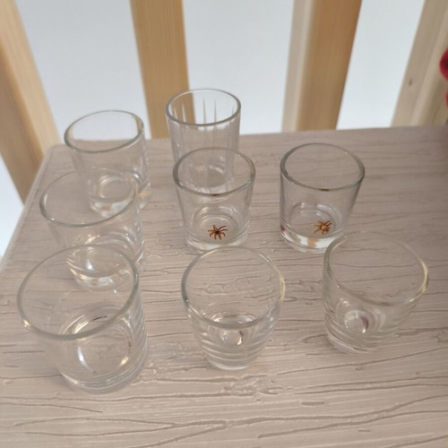 Shot glasses set of 8 with different designs like new