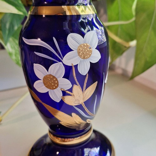 Blue vase with gold ornaments like new, solid glass