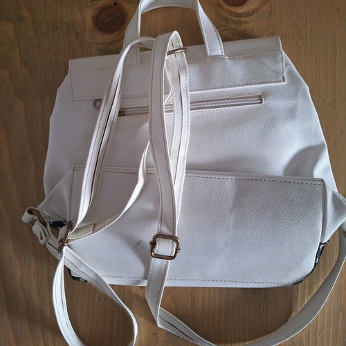 D. Raggi backpack with bow and polka dot details, like new