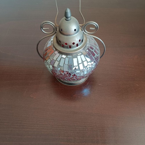 Decorative lantern with mosaic glass and metal frame used