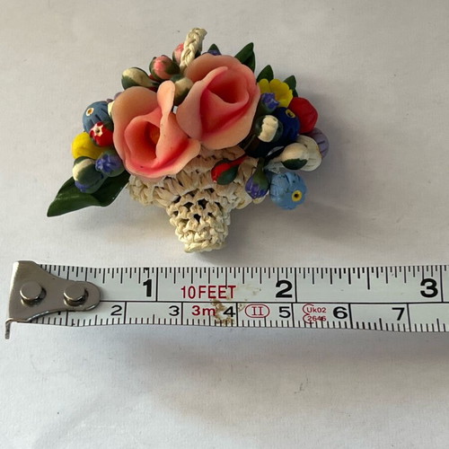 Vintage flower brooch with woven basket and plastic flowers like new