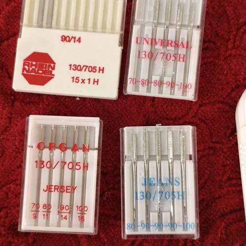 Sewing Machine Accessories Set like new with Needles, Button-Mate Tool & Oil