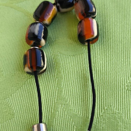 Begleri with colorful beads like new