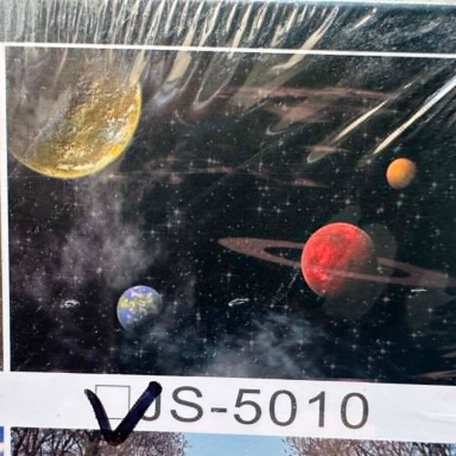 Two puzzles with 300 and 644 pieces, Chinese dragon relief and space planets