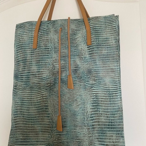 Leather bag like new with animal print