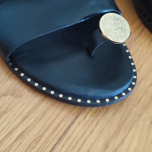 Black flat sandals with gold details like new