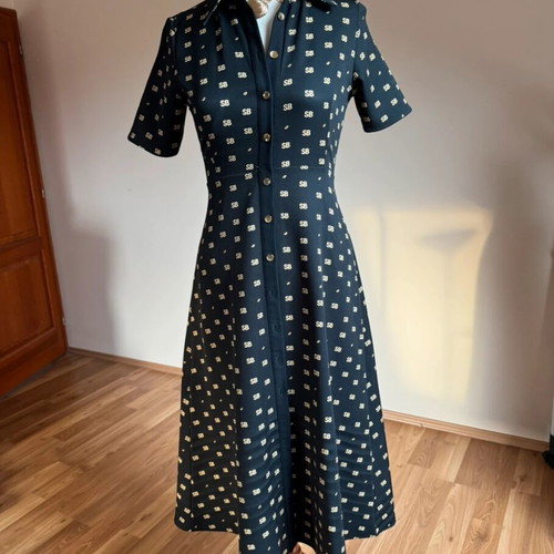 Sugarbird dress with buttons black with gold logo like new