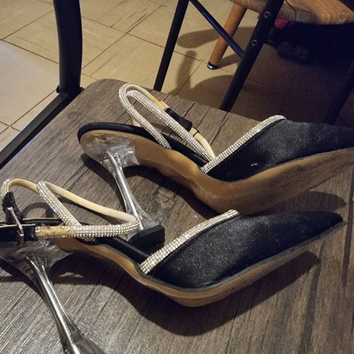 Black pumps with rhinestone detail used, size 38