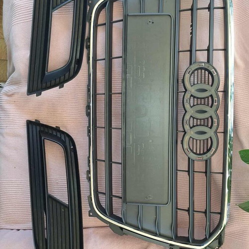 Audi A4 front grille and fog light covers like new
