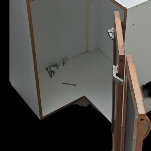 Corner kitchen cabinet used with signs of wear